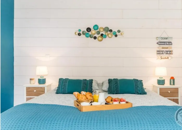 Les Pieds Dans L'eau Alojamento de Acomodação e Pequeno-almoço Merville-Franceville-Plage